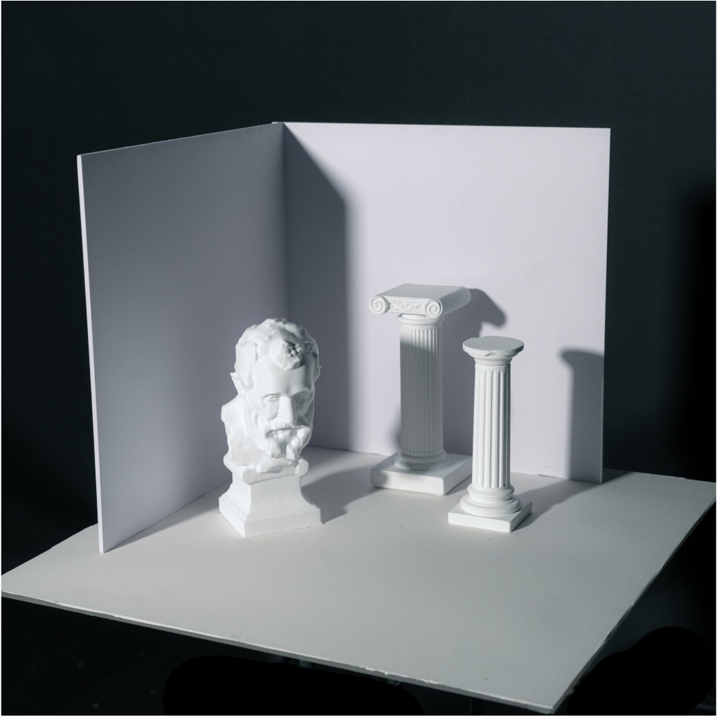 Color reference image of the statue scene.